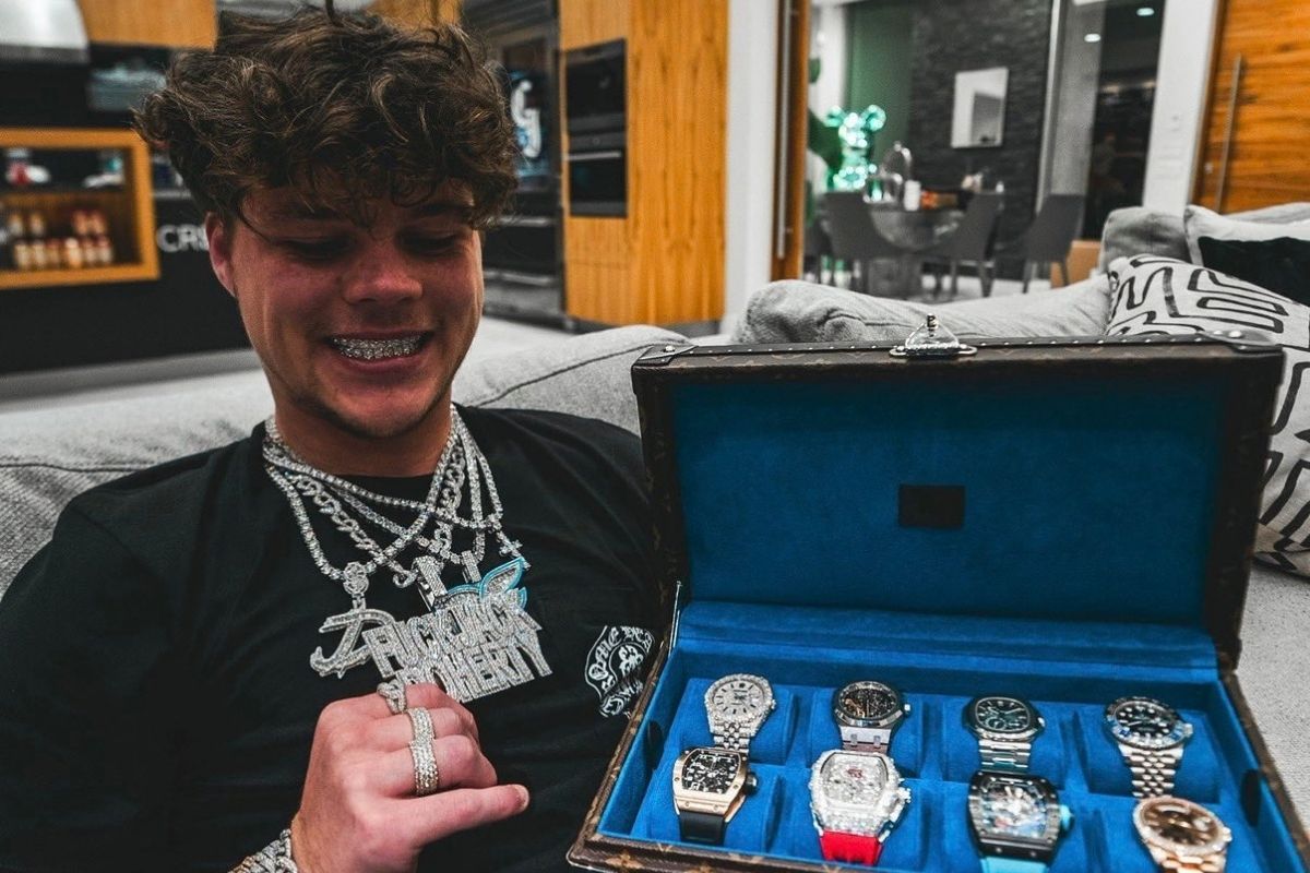 Jack Doherty seated beside an open watch case in a photo reproduced by IBTimes UK
